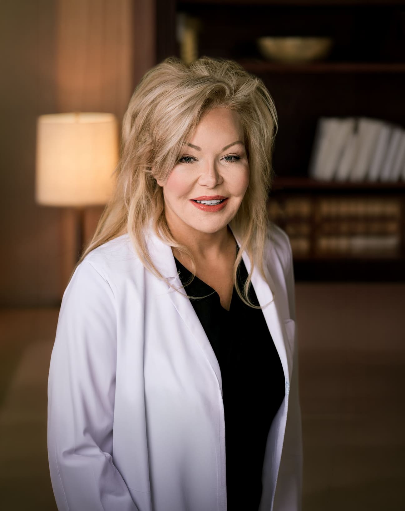 Dr. Kimberly Henry, board-certified plastic surgeon, in her practice