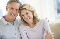 older couple smiling at camera