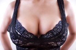busty woman in black bra