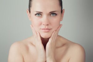 Girl with pretty blue eyes starring at the camera