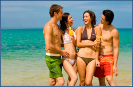 group of people laughing at beach