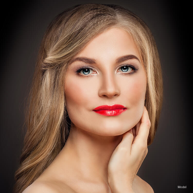 Beautiful woman with red lipstick