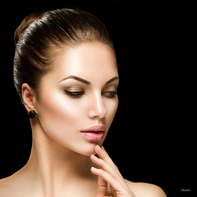 Model's face after a belfilla injectable filler