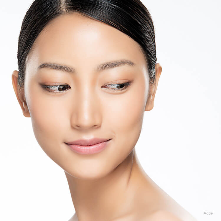 Model's face with a dermal implant